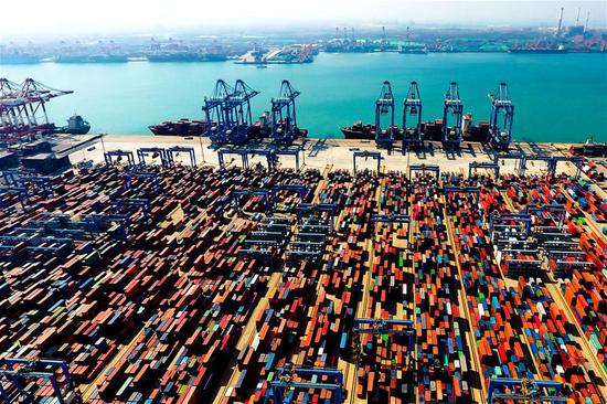 Aerial photo taken on May 4, 2018 shows the Qianwan Container Terminal in Qingdao, east China's Shandong Province.(TO GO WITH Xinhua Headlines:China's WTO entry a benefit to the world ) (Xinhua/Guo Xulei)