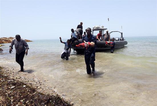 More than 100 migrants are feared dead after their boat capsized off the coast of Libya, the Libyan navy said Friday.