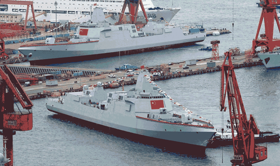 China launches two Type 055 guided-missile destroyers, widely considered Asia's biggest such combat vessels, at a shipyard in Dalian, Liaoning Province, on Tuesday.  (Photo/LIU DEBIN FOR CHINA DAILY)