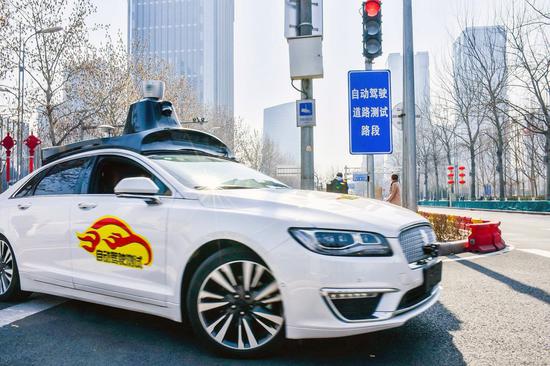 Baidu Apollo self-driving cars being tested on open roads in Beijing on March 22, 2018. (Photo/Asianewsphoto)