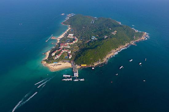 Wuzhizhou Island, off the coast of Sanya, Hainan Province, is now a popular tourist attraction in the tropical paradise. (Photo by Xing Guangli/Xinhua)