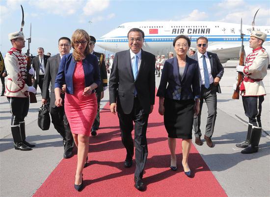 Chinese Premier Li Keqiang (C, front) arrives in Bulgaria on July 5, 2018, for an official visit to the country and the seventh meeting of heads of government of China and 16 Central and Eastern European Countries (CEEC) in Sofia. Li's visit is being made at the invitation of Bulgarian Prime Minister Boyko Borissov. (Xinhua/Liu Weibing)