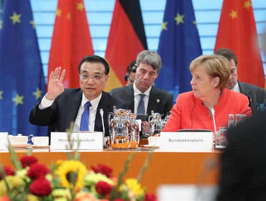 Chinese Premier Li Keqiang and German Chancellor Angela Merkel co-chair the fifth round of intergovernmental consultations in Berlin, Germany, July 9, 2018. (Xinhua/Liu Weibing)
