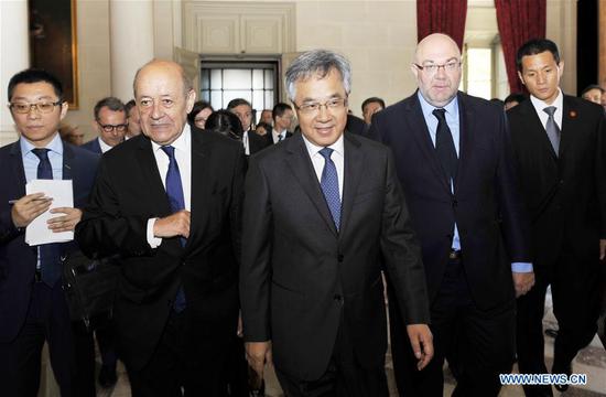 Visiting Chinese Vice Premier Hu Chunhua (C) meets with French Foreign Minister Jean-Yves Le Drian (2nd L) and Agriculture Minister Stephane Travert (2nd R) in Paris, France, July 9, 2018. (Xinhua/Li Genxing)
