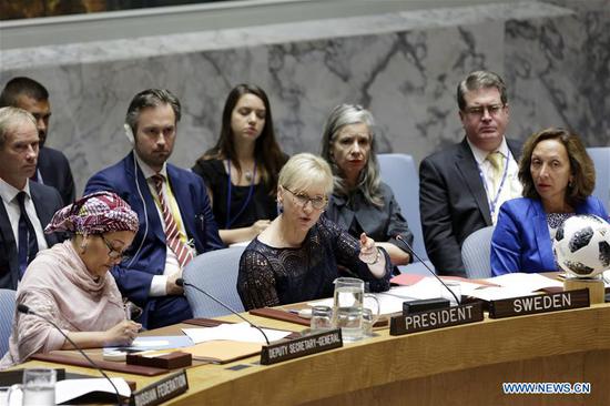 Swedish Foreign Minister Margot Wallstrom (C, Front), whose country holds the presidency of the Security Council for July, speaks at the UN Security Council high-level debate on climate-related security risks at the UN headquarters in New York, on July 11, 2018. UN Deputy Secretary-General Amina Mohammed on Wednesday highlighted the link between climate change and international peace and security and called for collective action. (Xinhua/Li Muzi)