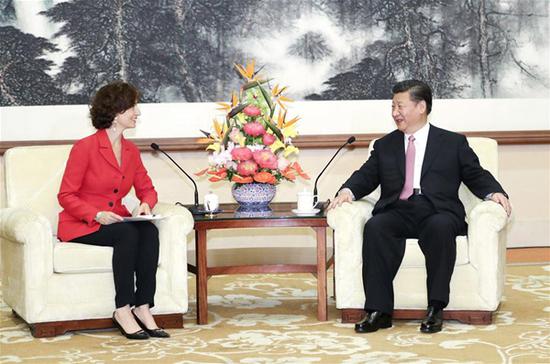 Chinese President Xi Jinping (R) meets with Director-General of the United Nations Educational, Scientific and Cultural Organization (UNESCO) Audrey Azoulay in Beijing, capital of China, July 16, 2018. (Xinhua/Xie Huanchi)