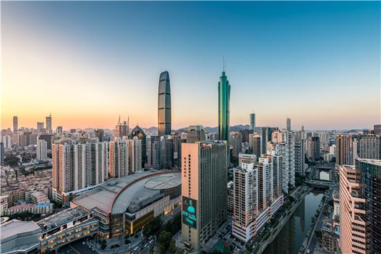 Luohu district in Shenzhen, which used to be a poor village, is now a flourishing residential area with modern apartment buildings. (Photo by Luo Haiming/China Daily)