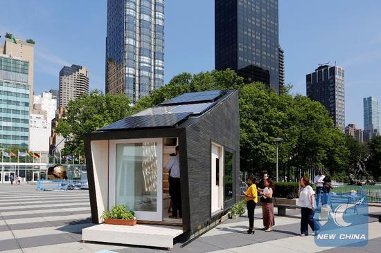 An Ecological Living Module, a 22 square meter tiny house, is displayed at the United Nations headquarters in New York, the United States, on July 16, 2018. (Xinhua/Li Muzi)