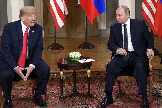 U.S. President Donald Trump (L) meets with his Russian counterpart Vladimir Putin in Helsinki, Finland, on July 16, 2018. (Xinhua/Lehtikuva/Heikki Saukkomaa)