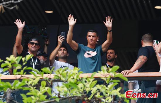Fans greet footballer Cristiano Ronaldo in Beijing