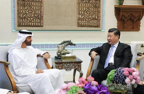 Chinese President Xi Jinping (R) is invited to the residence of Crown Prince of Abu Dhabi Sheikh Mohammed bin Zayed Al Nahyan, the United Arab Emirates (UAE), July 20, 2018. The pair exchanged views on China-UAE ties and issues of common concern. (Xinhua/Xie Huanchi)