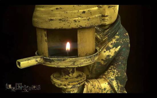 A Changxin figurine lamp of the Han dynasty. /Sina Photo