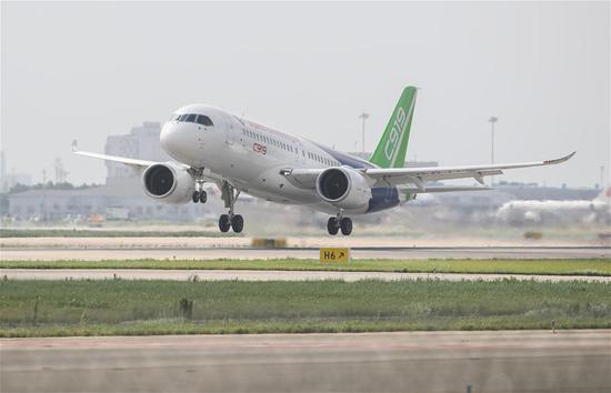 The No 102 C919 plane takes off at Pudong Airport in Shanghai, July 12, 2018. (Photo /Xinhua)
