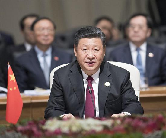 Chinese President Xi Jinping delivers a speech titled 