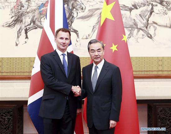 Chinese State Councilor and Foreign Minister Wang Yi and British Foreign Secretary Jeremy Hunt co-chair the Ninth China-UK Strategic Dialogue in Beijing, capital of China, July 30, 2018. (Xinhua/Ding Haitao)