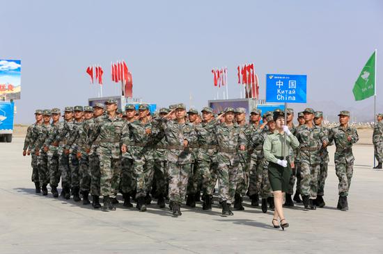 Chinese soldiers take part in an opening ceremony of the International Army Games 2018 in Korla, Xinjiang Uygur autonomous region on July 29, 2018. (Photo/Xinhua)