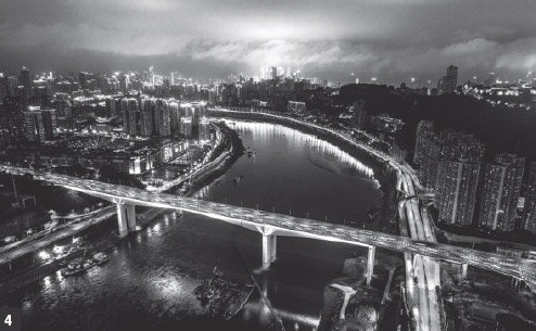 A night-view of Jiahua Bridge in Chongqing.(Photo by Geng Junyu/for China Daily)