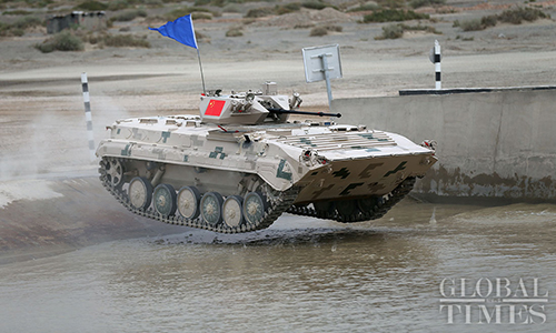 Crews from three fighting vehicle units of the Xinjiang Military Region, claimed victory over competitors from Kazakhstan, Iran and Belarus at the International Army Games 2018 held in Korla, Northwest China's Xinjiang Uyghur Autonomous Region on Monday in the “Suvorov attack for infantry fighting vehicle crews” segment of the competition. (Photo: Cui Meng/GT)
