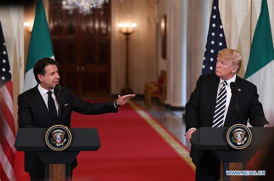 U.S. President Donald Trump (R) and Italian Prime Minister Giuseppe Conte attend a joint press conference at the White House in Washington D.C., the United States, on July 30, 2018. U.S. President Donald Trump said during the press conference that he is ready to meet with Iranian President Hassan Rouhani without preconditions. (Xinhua/Liu Jie)