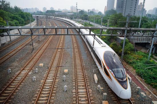 A bullet train runs on the rail. (File photo/Xinhua)