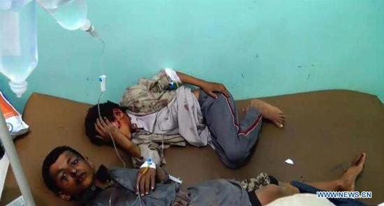 A TV grab on Aug. 9, 2018 shows children at a local hospital in province of Saada, Yemen. At least 43 civilians, mostly children, were killed on Thursday when Saudi-led coalition air strikes hit buses in Yemen's northern province of Saada, the head of Saada Health Office Yahya Shayem told Xinhua. (Xinhua) 