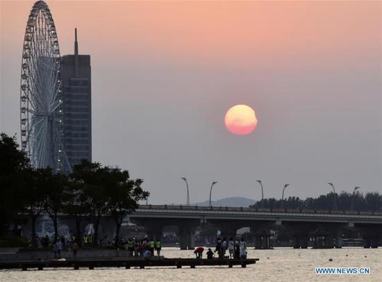 Photo taken on Aug. 11, 2018 shows the sun going through a partial solar eclipse in Wuxi City, east China's Jiangsu Province. [Photo: Xinhua]