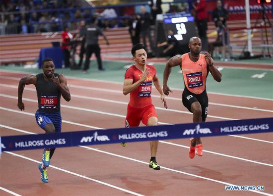 Xie Zhenye(C) of China competes during the Joe Yancey Men's 60m of the 111th NYRR Millrose Games in New York, the United States on Feb. 3, 2018. Xie Zhenye won the third place by 6.588 seconds. (Xinhua/Wang Ying)