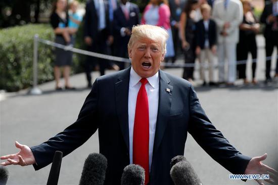U.S. President Donald Trump speaks to reporters before leaving the White House in Washington D.C., the United States, Aug. 17, 2018. U.S. President Donald Trump on Friday defended his former campaign chairman, Paul Manafort, as a 