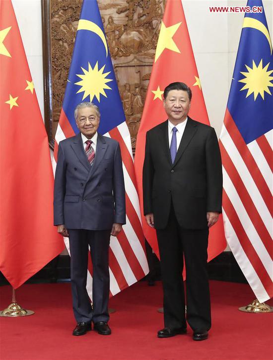 Chinese President Xi Jinping (R) meets with Malaysian Prime Minister Mahathir Mohamad in Beijing, capital of China, Aug. 20, 2018. (Xinhua/Pang Xinglei)