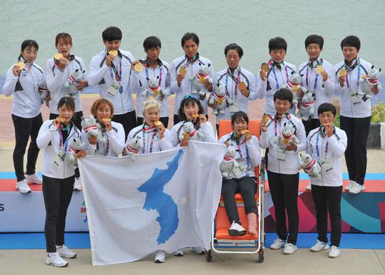Unified Korean team wins first medal