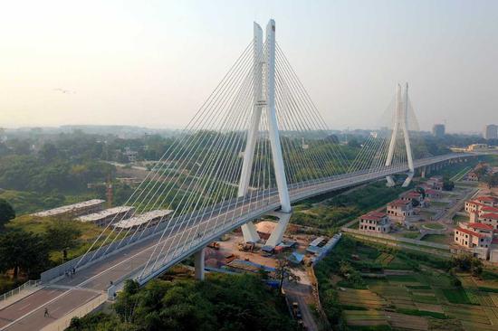 An aerial photo of China-built Brazzaville cable-stayed bridge in Brazzaville, Republic of Congo, June 10, 2018. (Photo/Xinhua)