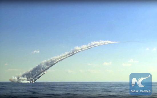 A Russian submarine in the Mediterranean fires a long-range Kalibr cruise missile at the Islamic State group's positions in Syria on Oct. 5, 2017.