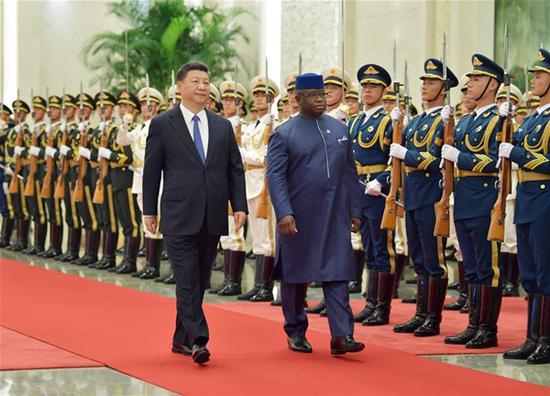 Chinese President Xi Jinping holds a welcome ceremony for Sierra Leonean President Julius Maada Bio before their talks at the Great Hall of the People in Beijing, capital of China, Aug. 30, 2018. (Xinhua/Li Tao)