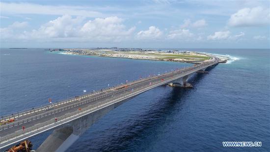 Photo taken on Aug. 30, 2018 shows the aerial view of the China-Maldives Friendship Bridge, in Maldives. The China-Maldives Friendship Bridge, the first cross-sea bridge in the Maldives, opened to traffic on Thursday evening. The bridge is an iconic project of the Maldives and China in co-building the 21st Century Maritime Silk Road. (Xinhua/Wang Mingliang)