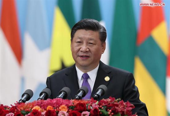 Chinese President Xi Jinping delivers a keynote speech titled 
