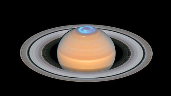 A composite image puts the Hubble Space Telescope's measurements of Saturn's ultraviolet northern auroras on top of a visible-light image of the planet. Hubble measured Saturn's auroras during the months surrounding its northern solstice to learn more about the planet's magnetic field. (
Credit: ESA/Hubble, NASA, A. Simon (GSFC) and the OPAL Team, J. DePasquale (STScI), L. Lamy)