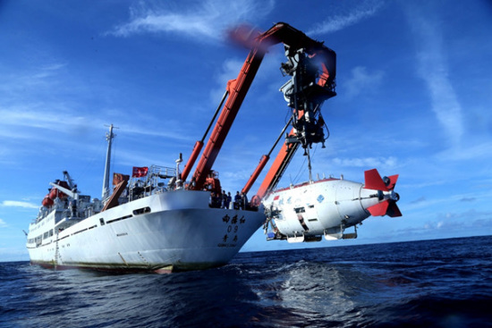 Jiaolong, China's manned submersible, is lowered for a dive on June 20, 2017. (Photo/Xinhua) 