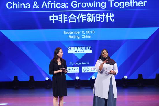 Hodan Osman Abdi (R), advisor of Somali president, founder and executive director at Center for East African Studies at Institute of African Studies of Zhejiang Normal University, speaks at the fourth event of Vision China in Beijing, Sept. 6, 2018. (Photo by Wang Jing/chinadaily.com.cn)
