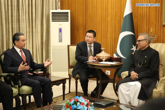 Pakistani President Arif Alvi meets with visiting Chinese State Councilor and Foreign Minister Wang Yi in Islamabad, Pakistan, on Sept. 9, 2018. (Xinhua/Liu Tian)