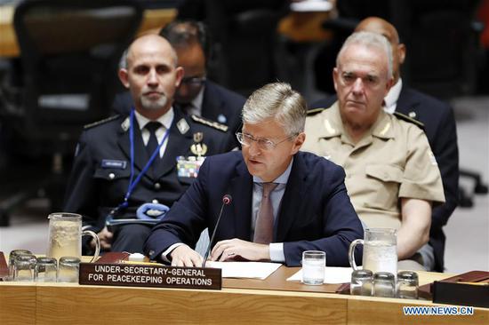 UN Under-Secretary-General for Peacekeeping Operations Jean-Pierre Lacroix (Front) briefs the Security Council during an open debate on peacekeeping operations at the UN headquarters in New York, on Sept. 12, 2018. UN Under-Secretary-General for Peacekeeping Operations Jean-Pierre Lacroix on Wednesday urged member states to contribute more troops and police to UN peacekeeping. (Xinhua/Li Muzi)