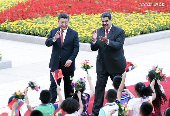 Chinese President Xi Jinping holds a welcome ceremony for his Venezuelan counterpart Nicolas Maduro before their talks in Beijing, capital of China, Sept. 14, 2018. (Xinhua/Yao Dawei)