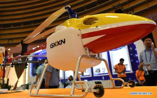 High-tech exhibits attract visitors at 15th China-ASEAN Expo