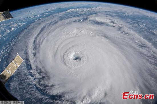 A view of Hurricane Florence is shown churning in the Atlantic Ocean in a west, north-westerly direction heading for the eastern coastline of the United States, taken by cameras outside the International Space Station, Sept. 12, 2018. (Photo/Agencies)