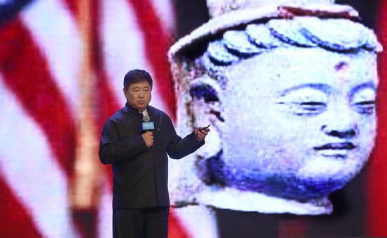 Shan Jixiang, Palace Museum director, speaks at the opening ceremony of the third Taihe Forum on Protecting the World's Ancient Civilizations in Beijing on Sunday. (Photo by Zou Hong/China Daily)