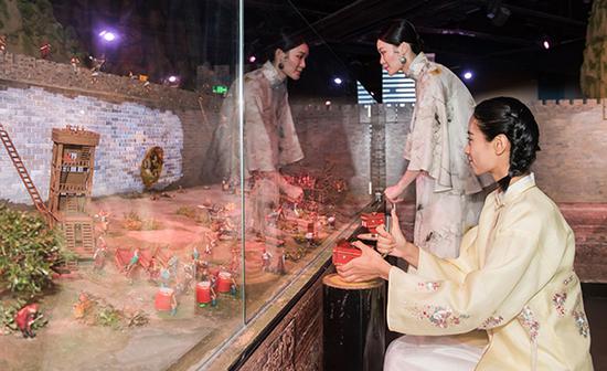 Visitors enjoy exhibits at Little Big City Beijing. (Photo provided to China Daily)