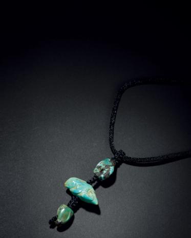 A rabbit-shaped turquoise accessory from the Warring States Period (475-221 BC). (Photo/dpm.org.cn)