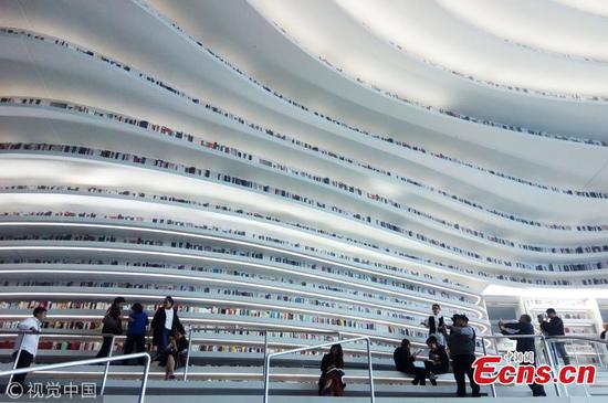 The roof and walls of the Binhai New Area library is pictured on Oct 2, 2017. As the flowing design resembles sea waves, many internet users commented, 