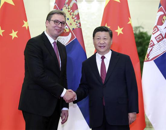 President Xi Jinping welcomed Serbian President Aleksandar Vucic who is in China to attend the Summer Davos Forum at the Great Hall of the People in Beijing, a day before the opening ceremony of the forum to be held in Tianjin. (Photo/Xinhua)