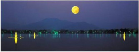 The full moon is seen against West Lake in Hangzhou, Zhejiang Province. For the Chinese, Mid-Autumn Festival is the second most important festival after Chinese New Year.  (File photo)