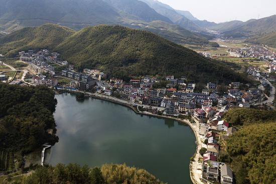 A bird's-eye view of Anji county, Huzhou city, Zhejiang Province, where President Xi Jinping proposed a new development method. (Photo/XINHUA)